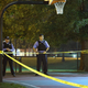 Police investigate the shooting in Cornell Square Park in Chicago on Sept. 19, 2013. (Scott Olson/Getty Images)